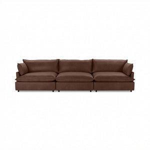 Classic Home Caplan modular sectional sofa with plush fabric cushions and contemporary design in a living room setting.