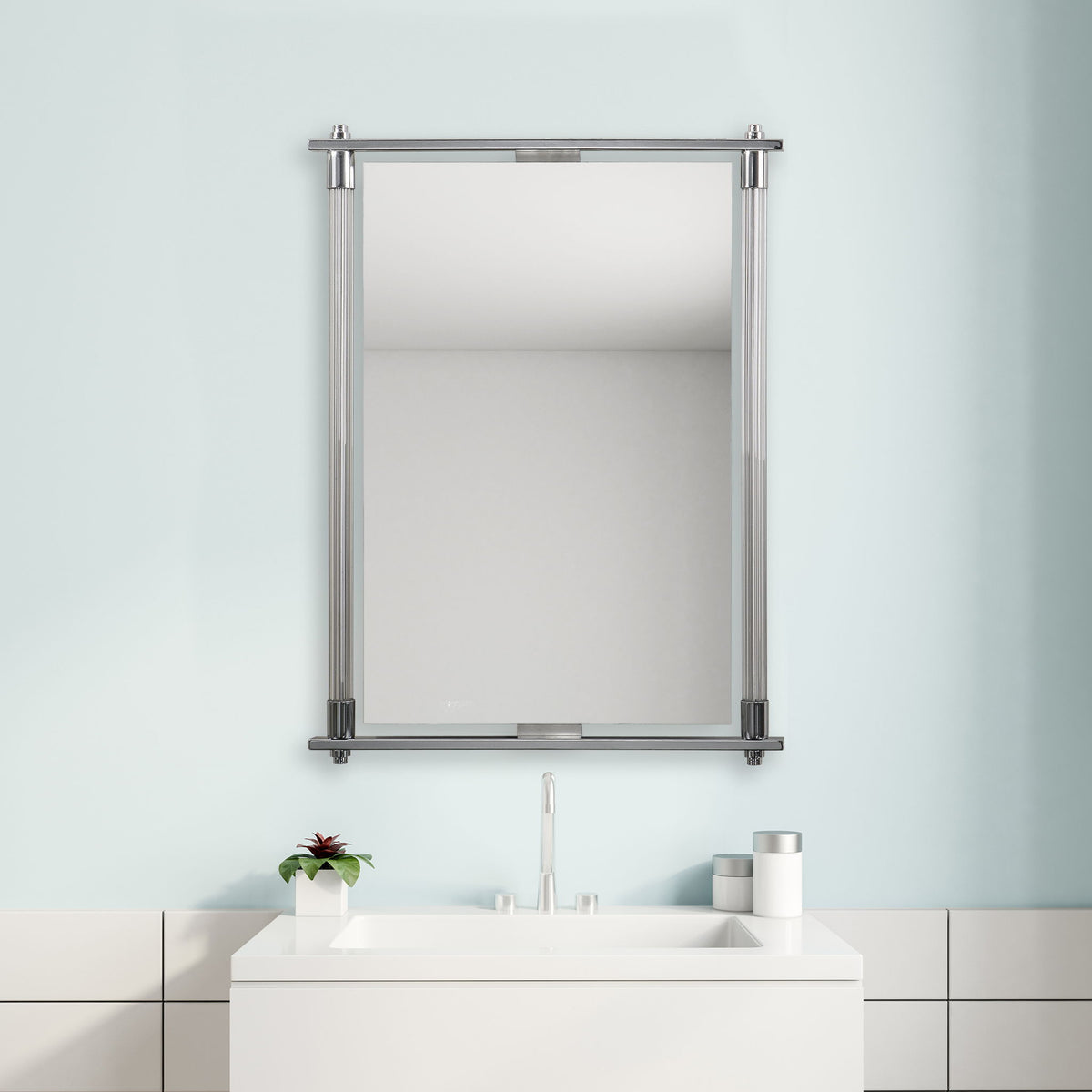 Uttermost Adara pearl silver vanity mirror with a sleek, modern framed design, reflecting a stylish and elegant bathroom or bedroom decor