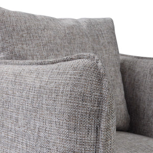 Uttermost Corben swivel chair with curved fabric seat and metal base, modern design for living room or office space.