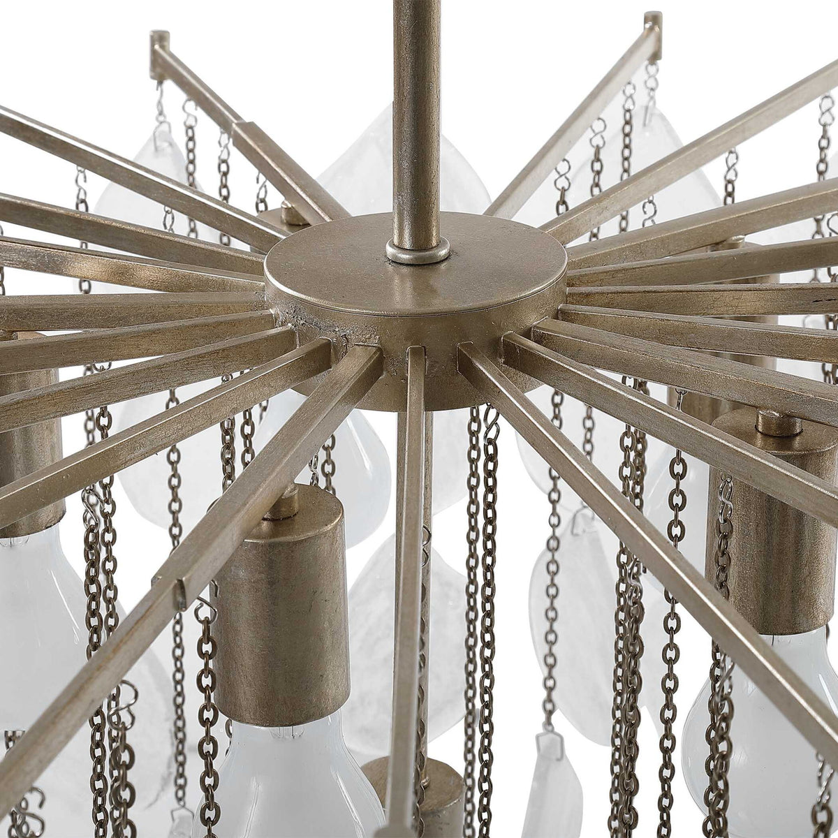Uttermost Goccia tear drop glass pendant light hanging with a sleek metal fixture and clear glass teardrop shape.