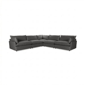 Classic Home Caplan modular sectional sofa with beige fabric upholstery and plush cushions in a modern living room setting.
