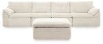 Ivory Fannin 4-piece sectional with Ottoman from Signature Design by Ashley, featuring plush cushions and modern design.