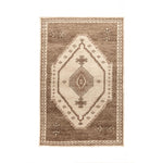 Hand-knotted Luxor area rug by Classic Home featuring intricate patterns and rich colors, perfect for adding elegance to a living space.