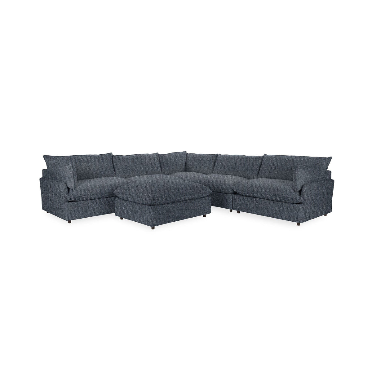 Classic Home Caplan 6-piece modular sectional with ottoman in neutral fabric, arranged for a modern living room setting.
