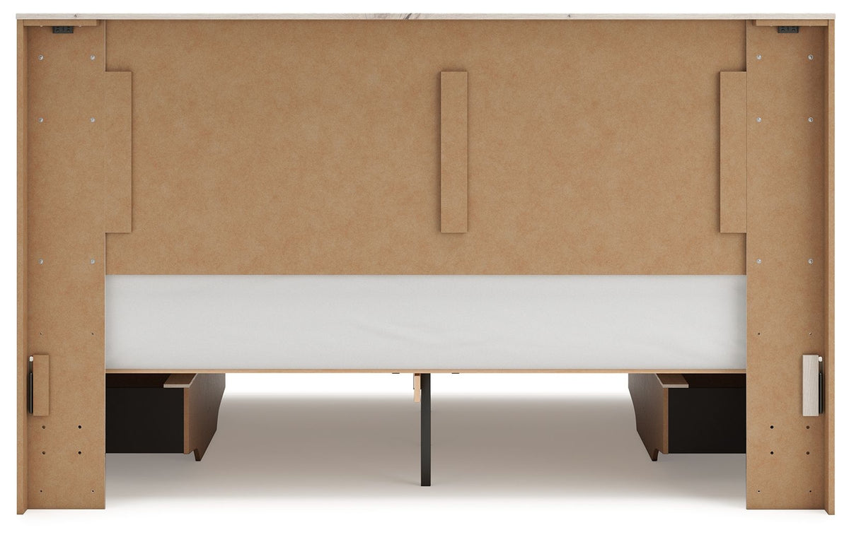Signature Design by Ashley Lawroy panel bed with built-in storage drawers in a modern bedroom setting.