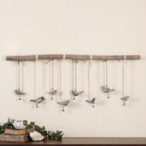 Light brown Birds on a Branch wall art by Uttermost, decorative wall decor with detailed bird and branch design.