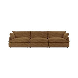 Classic Home Caplan modular sectional sofa with plush cushions and modern design, shown in a spacious living room setting.