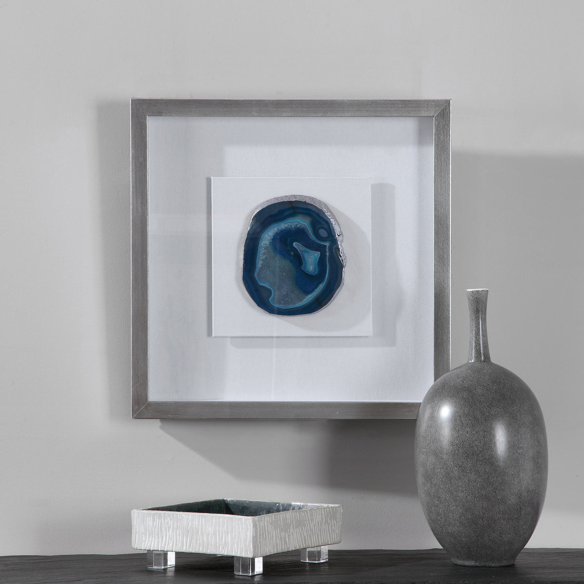 Uttermost Kalia Stone Shadow Box wall decor featuring a blue textured stone design for modern interior decoration.