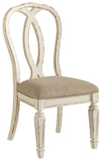 Realyn - Dining UPH Side Chair (Set of 2) - Ribbonback - Chipped White - R&R Furniture Gallery (Fountain Valley, CA)
