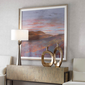 Framed print titled Dawn On The Hills by Uttermost, featuring a purple landscape scene in a stylish frame.