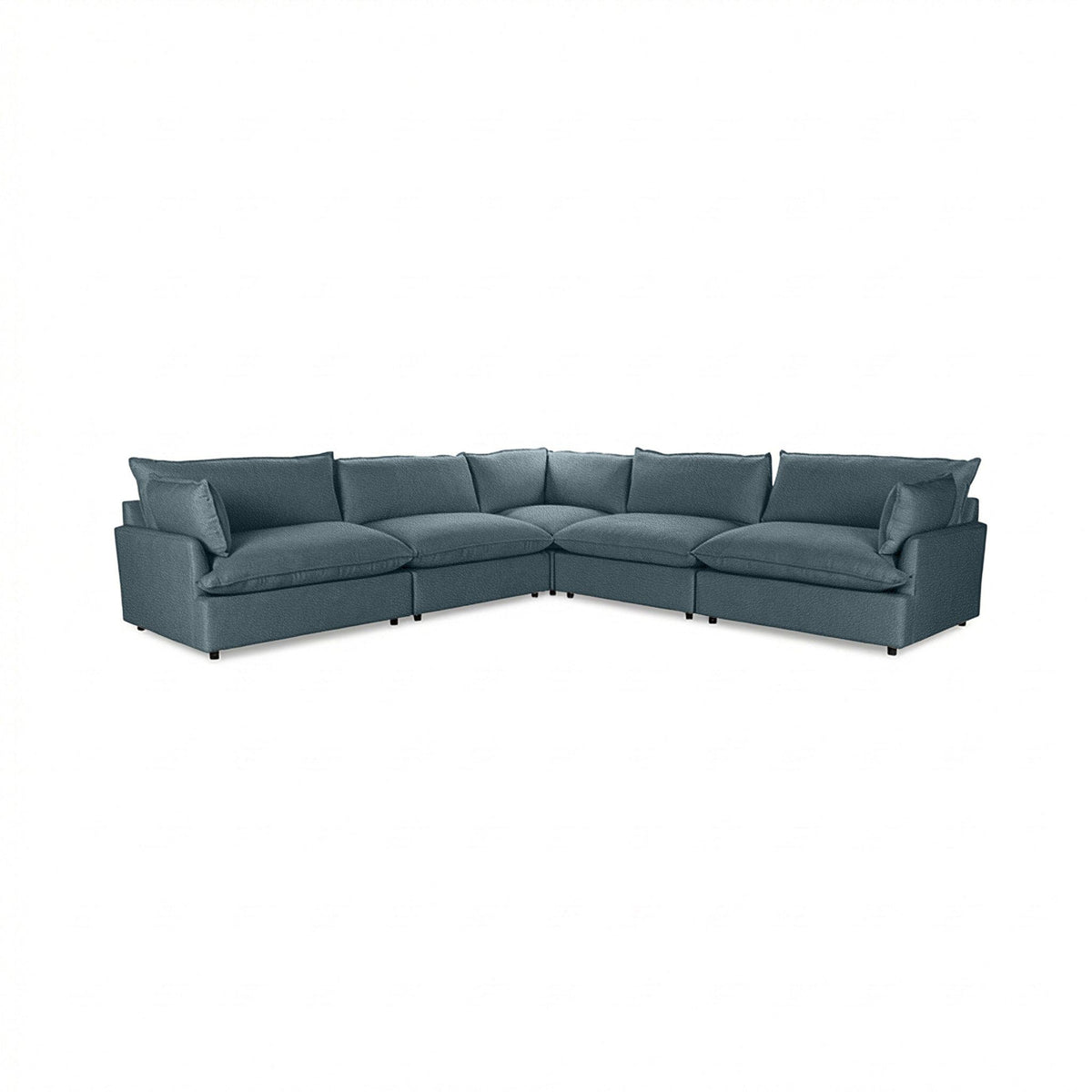 Classic Home Caplan modular sectional with plush fabric cushions and modern design, shown in a spacious living room setting.