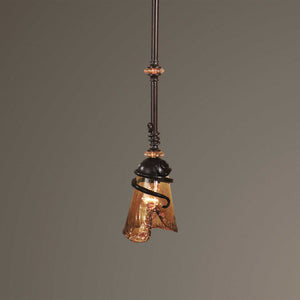 Uttermost Vitalia mini pendant light in oil rubbed bronze with a sleek, modern design hanging from a ceiling fixture.
