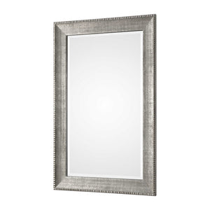 Silver metallic wall mirror by Uttermost, Leiston model, with a sleek and modern design perfect for contemporary decor.