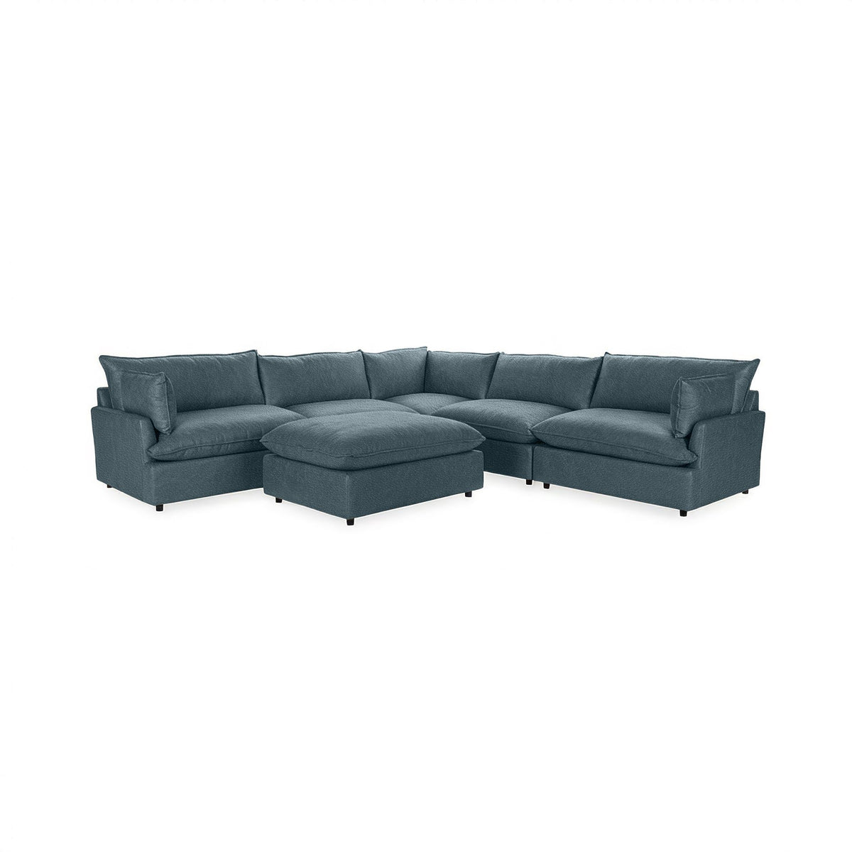 Classic Home Caplan 6-piece modular sectional with ottoman, showing plush fabric cushions and modern living room setup.