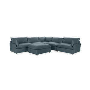 Classic Home Caplan 6-piece modular sectional with ottoman, showing plush fabric cushions and modern living room setup.