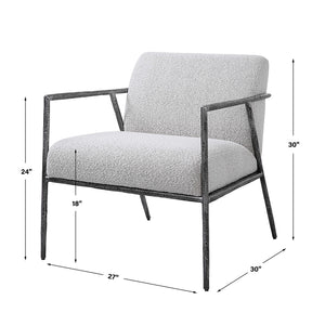 Light gray Uttermost Brisbane accent chair with sleek modern design and wooden legs, perfect for living room or bedroom decor.