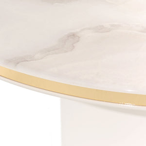 Michael Amini Gineverra round cocktail table with ivory and gold finish, showcasing elegant design and smooth surface.