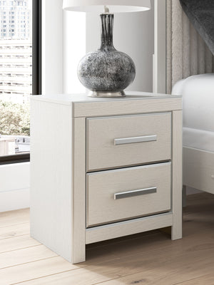 Zuraleus - Two Drawer Night Stand - R&R Furniture Gallery (Fountain Valley, CA)