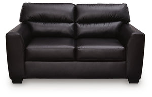 Midnight-colored Glennbre stationary loveseat by Signature Design Ashley, featuring plush cushions and a cozy, modern design.