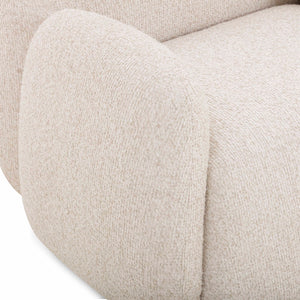 TOV Furniture Marius accent arm chair with beige upholstery and wooden legs, showcasing a stylish and comfortable design.