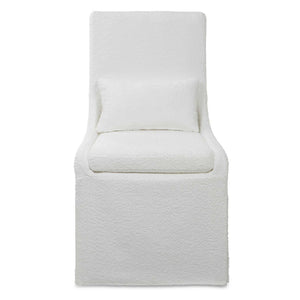 Uttermost Coley armless side chair with plush upholstery and sleek wooden legs, modern design for living or dining spaces.