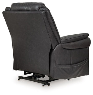 Signature Design by Ashley Oatman Power Lift Recliner in plush fabric, showing the reclined chair with armrests and control panel.