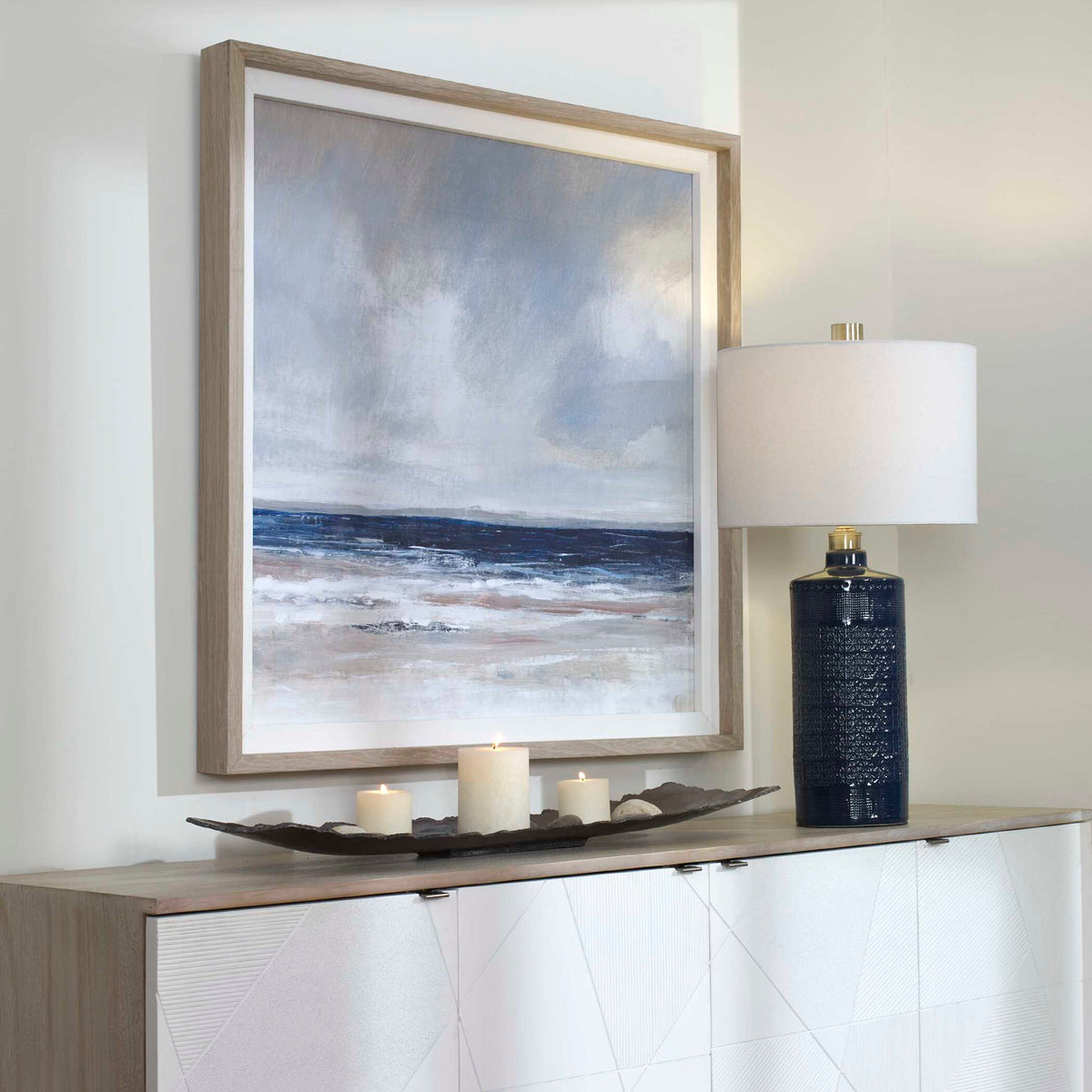 Uttermost Distant Land framed print featuring a blue landscape design on a white background.