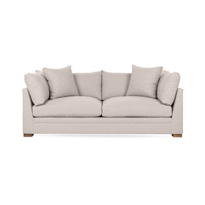 Classic Home Audrey stationary sofa with plush upholstery and elegant design, shown in a cozy living room setting.