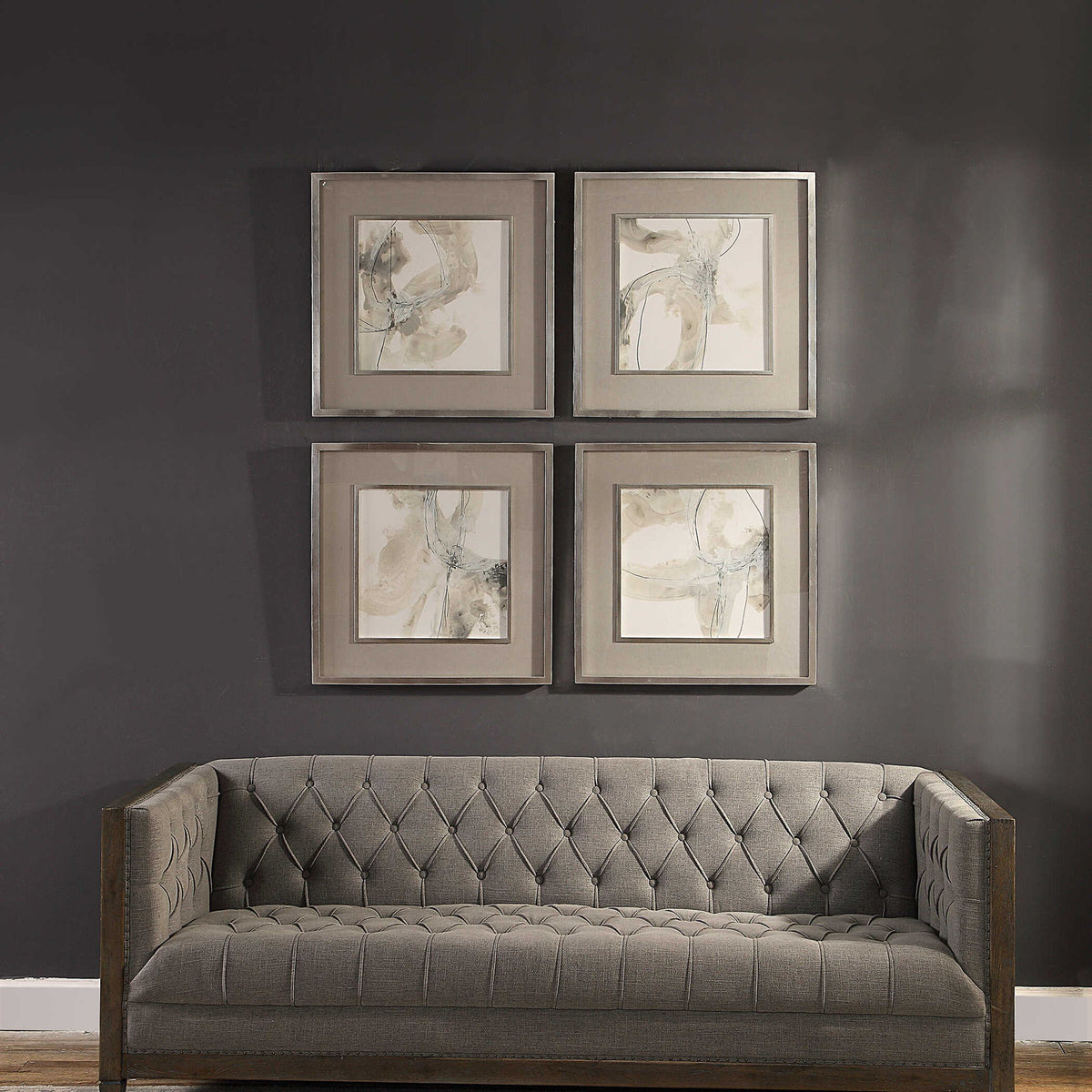 Set of four beige framed prints featuring abstract divination art by Uttermost, displayed on a neutral background.