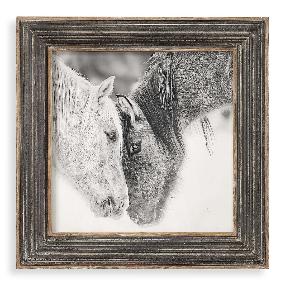 Framed print of black and white horses on dark brown background by Uttermost, showcasing detailed horse artwork in a stylish frame.
