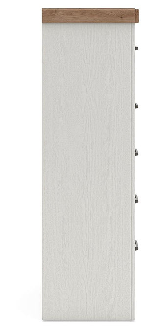 Benchcraft® Savonport five-drawer chest in white and brown, featuring accent chest design with multiple storage drawers.