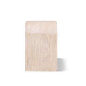 White washed Dune side table by Jennifer Taylor Home, featuring a sleek modern design with a smooth surface and sturdy legs.