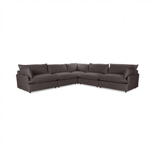 Classic Home Caplan modular sectional sofa with plush cushions and neutral fabric, showcasing its stylish stationary design.