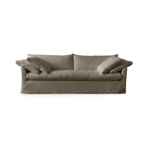 Classic Home Cassiano slip cover sofa in beige fabric, stationary sofa with plush cushions and tailored slip cover design.