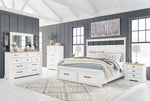 Ashbryn 6-piece bedroom set by Benchcraft® featuring panel storage beds and coordinating bedroom furniture in a modern design.