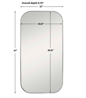 Uttermost Taft wall mirror with a sleek, modern frame hanging on a wall, showcasing its stylish design and reflective surface.