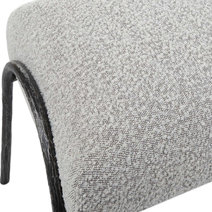 Gray upholstered Jacobsen Modern Bench by Uttermost featuring sleek design and plush fabric upholstery.