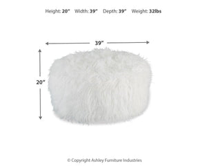 Large Signature Design by Ashley Galice oversized ottoman in neutral fabric, serving as a stylish accent piece.