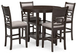 Signature Design by Ashley Langwest 5-piece brown dining room counter table set with matching chairs.