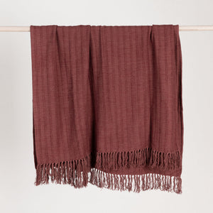 Hunter throw blanket by Classic Home, soft and cozy fabric with a stylish pattern, shown draped over a sofa.