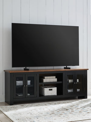 Wildenauer - XL TV Stand With Fireplace Option - Brown / Black - R&R Furniture Gallery (Fountain Valley, CA)