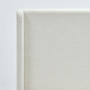 Caron ivory king size upholstered wingback bed with high headboard by House & Home Furniture