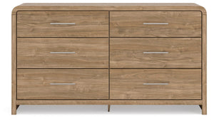 Signature Design by Ashley Six Drawer Dresser with sleek wooden finish and modern hardware, ideal for bedroom storage and organization.