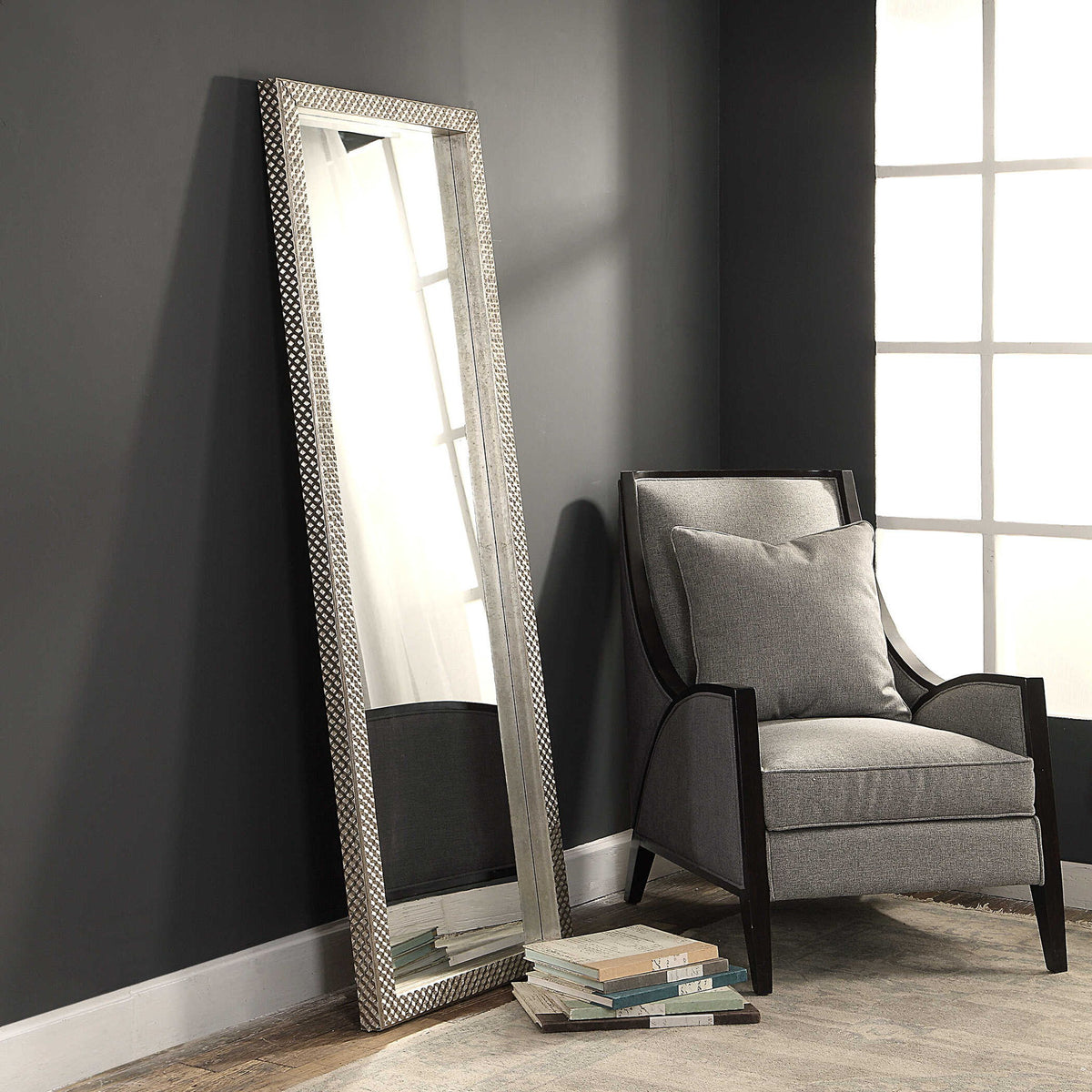 Silver metallic floor mirror by Uttermost with a sleek, modern frame and reflective surface for stylish home decor.