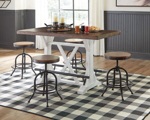 Rectangular white and brown Valebeck dining room counter table by Signature Design Ashley, showing a modern wooden table with clean lines.
