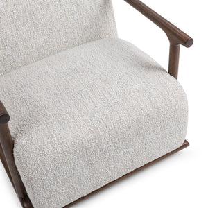 Classic Home Lucia swivel chair with plush upholstery and modern design, shown in a cozy living room setting.