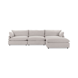 Classic Home Caplan modular sectional showing beige fabric with plush cushions and a modern design in a living room setting.