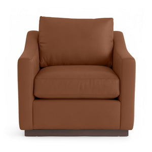 Classic Home Aspen accent arm chair with plush upholstery and wooden legs in a cozy, stylish living room setting.