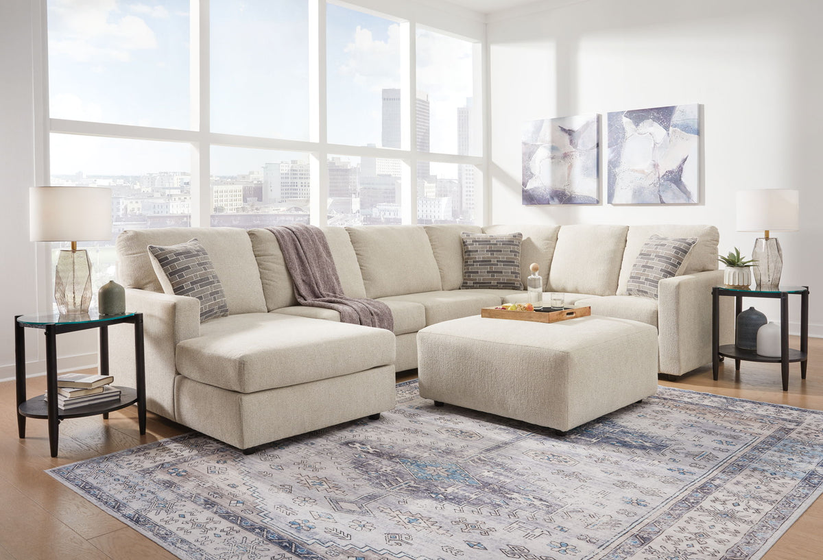 Signature Design by Ashley Edenfield 4-piece living room set with sofa, loveseat, and chairs in a modern living space.