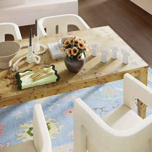 TOV Furniture Brandyss rectangular dining table in natural burl wood with a sleek modern design.